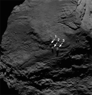 Illustration for article titled The Mysterious Balancing Boulders Of Rosetta's CometÂ